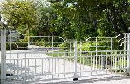Modern Metal Driveway Design with matching Front Entrance Gates and Garden Gates 