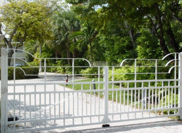 Modern Metal Driveway Design with matching Front Entrance Gates and Garden Gates 